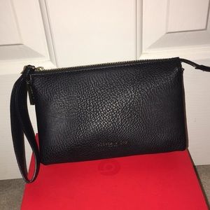 Olivia + Joy black wristlet.